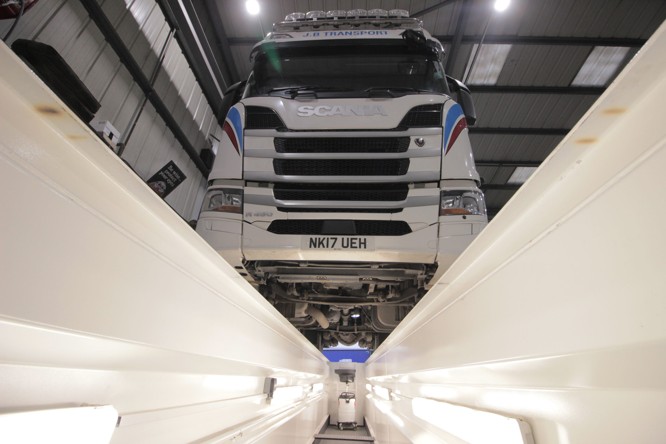 Vehicle inspection pit with HGV over pit